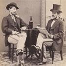 Two men drinking wine